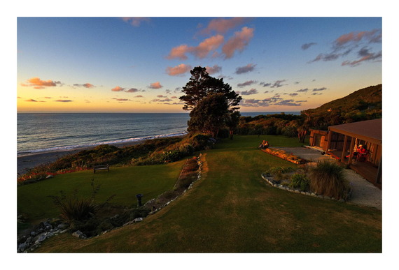 Guests enjoying the sunset over tasman sea from Breakers Boutique Accommodation West Coast